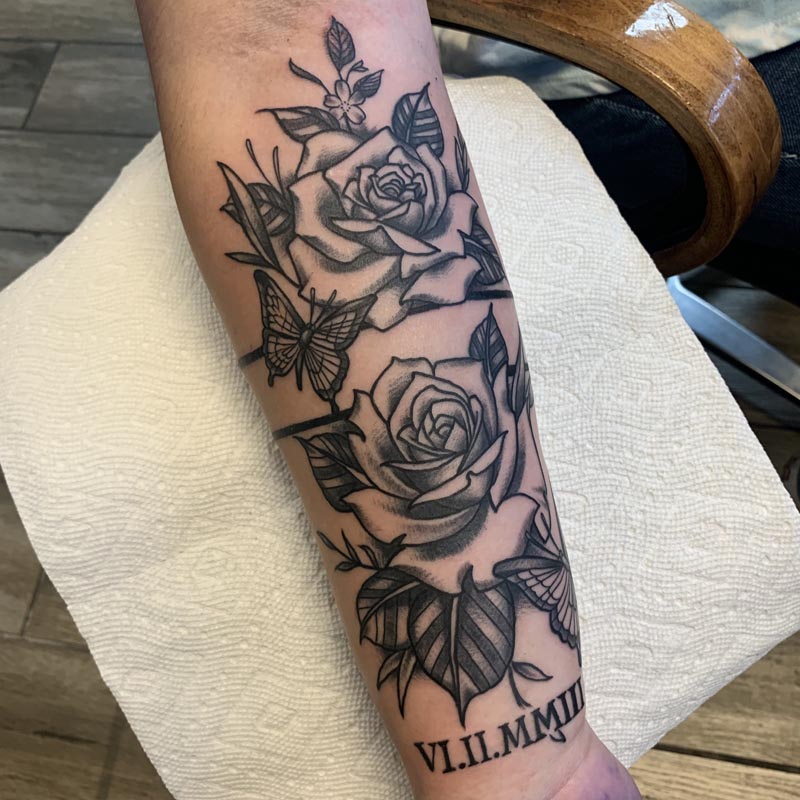 Black and Gray Flower Realism tattoo by