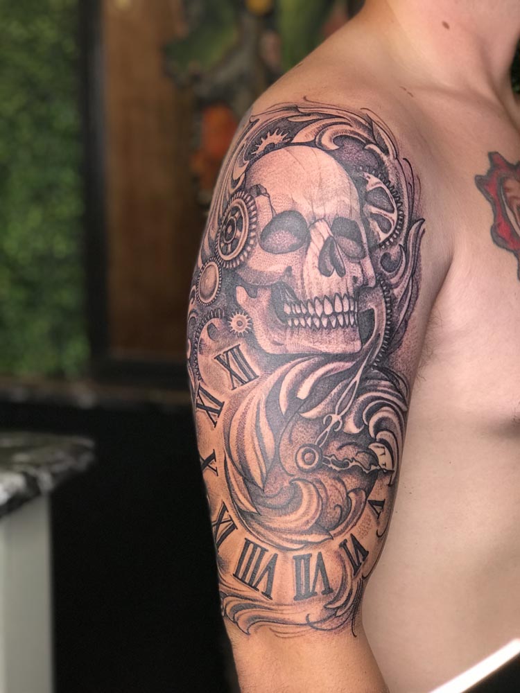 black and grey skull half sleeve tattoos