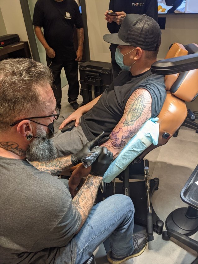 Christian Reilly tattooing client at H&H Tattoo Co. Las Vegas