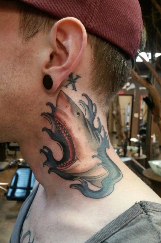 Tyler Phillips' tattoo, Social Media Manager at Hart & Huntington.