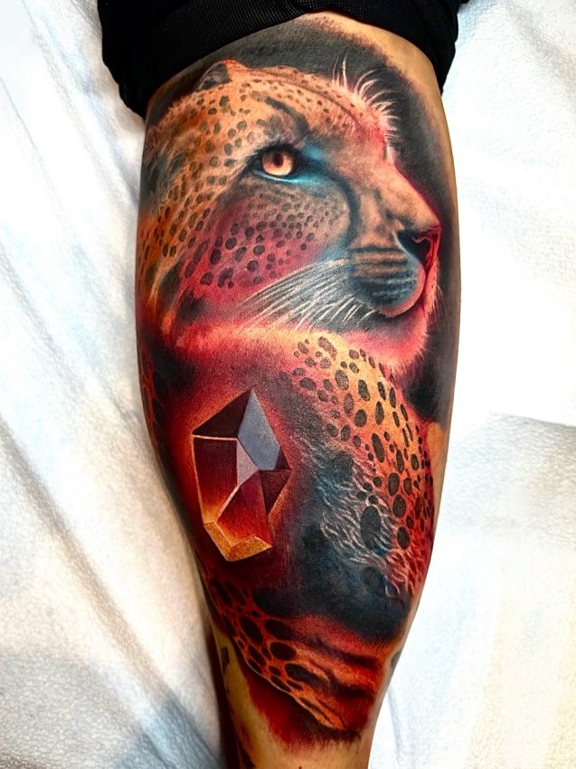 Kai's leopard tattoo
