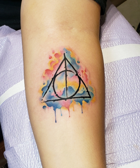Tattoo uploaded by 2 Extreme Tattoos and Body Piercing  Deathly Hallows Watercolor  Tattoodo