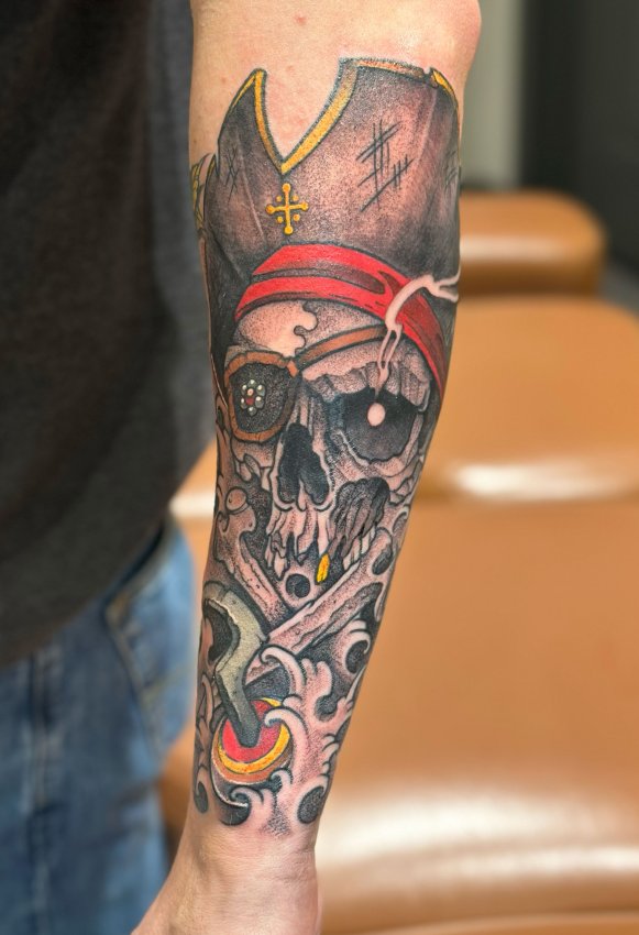 sugar skull and crossbones tattoo